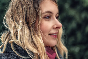 New Year's photos of a beautiful girl in the forest with a decorated Christmas tree, filled with...