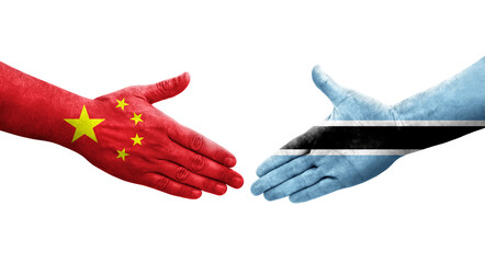 Handshake between Botswana and China flags painted on hands, isolated transparent image.