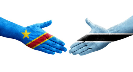 Handshake between Botswana and Dr Congo flags painted on hands, isolated transparent image.