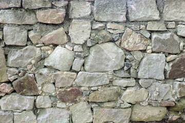 A stone wall, a wall made of stones