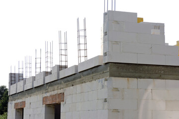 A reinforced concrete beam, steel reinforcement for pillars on the first floor of a house under...