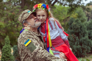Little Ukrainian girl meets dad from the war.