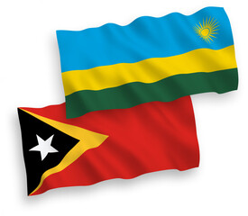 Flags of Republic of Rwanda and East Timor on a white background