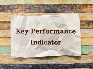 key performance indicator word on crumpled paper note