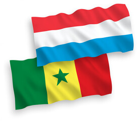 Flags of Republic of Senegal and Luxembourg on a white background