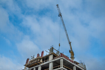 Formwork panels connected by clamps at the construction of an elevator shaft.