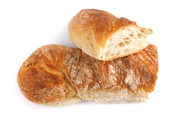 Cut in half Swabian baguette isolated on white background.