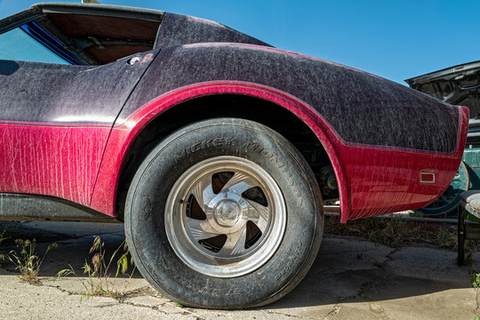A Mickey Thompson GT Stingray tire on the rear of an old Corvette in Wells, Nevada, USA - June 18, 2022