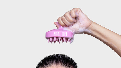 girl top of head with shampoo foam on hair using silicone brush for scalp massage hair growth stimulation mockup free space for text.woman in different poses holding brush with hand finger - obrazy, fototapety, plakaty
