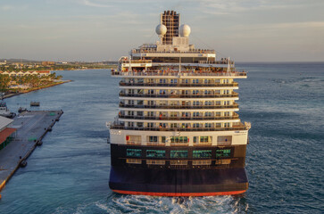 Modern HAL cruiseship or cruise ship liner Koningsdam sail away departure from port during...
