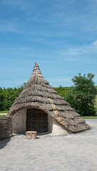Stoneage  wooden hut with roof - 538302801
