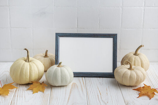Interior design with autumn fall decor and picture frame mockup.