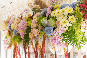 Colorful natural flowers decoration on a wedding venue