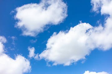 Fototapeta premium White clouds against the blue sky.