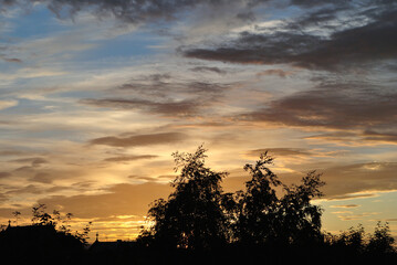 Obraz na płótnie Canvas Sunset Silhouette of Clouds & Landscape