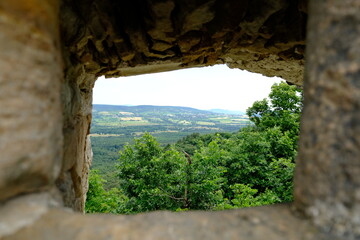 view from castle ruin with hills and fields