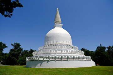 buddhist stupa in the sunshine - obrazy, fototapety, plakaty