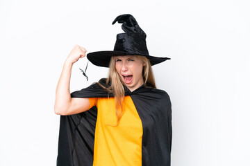 Young blonde woman dressed as a witch isolated on white background doing strong gesture