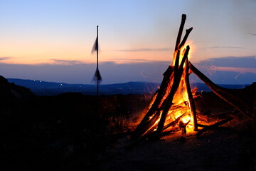 bonfire with sparkles at dusk