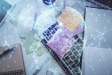 Multi exposure of brain sketch hologram over topview work table background with computer. Concept of big data.