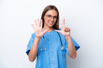 Young nurse caucasian woman isolated on white background counting seven with fingers