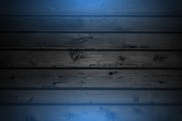 Grunge wooden planks with blue neon illumination abstract background. Vector retro design