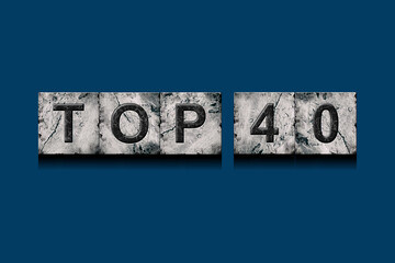Top 40, words, above different numbers, on a dark blue background. Alphabet on stone blocks.Rating. Rating concept.