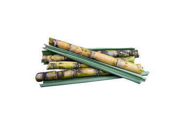 Fresh organic sugarcane with leaf isolated on the background 