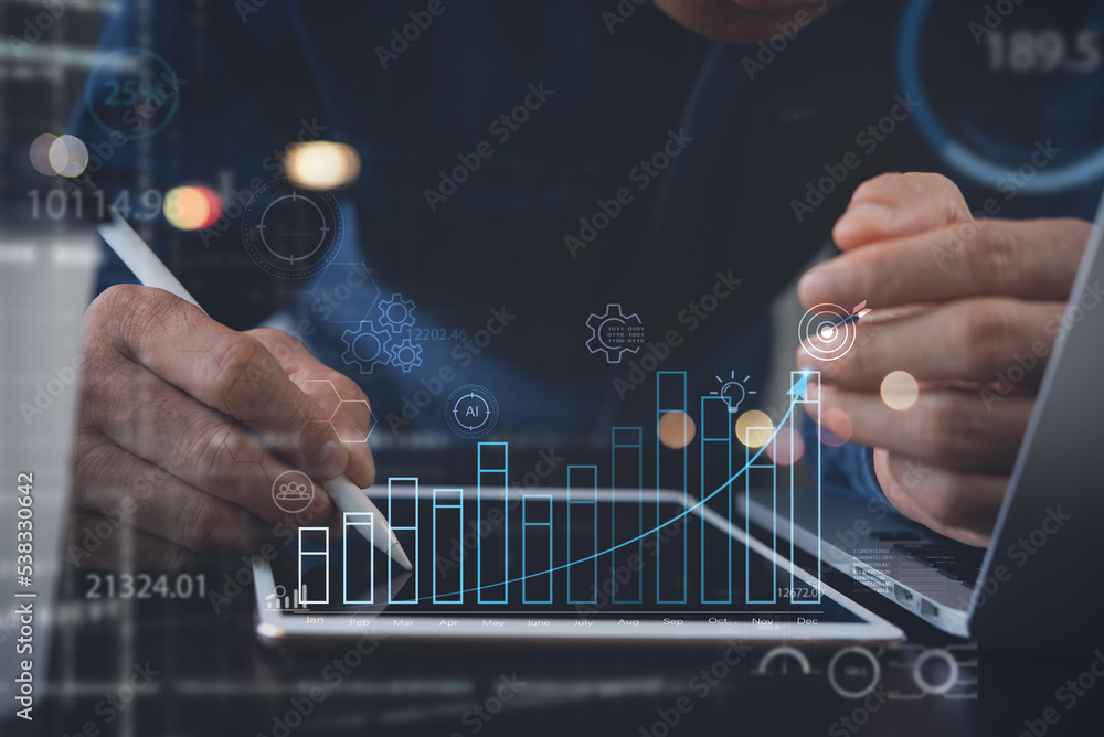 Poster data analysis. businessman using tablet analyzing sales data and economic growth graph chart. busine