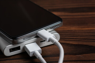 Portable power bank in a charger smartphone process