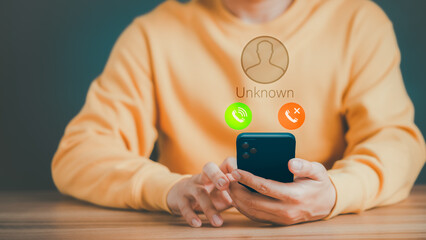 Man answering to incoming call. Phone call from unknown number. Call center gang, scammer or stranger. Hoax person with fake identity. Scam, fraud or phishing with mobile phone or smartphone concept.