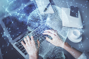 Double exposure of woman hands working on computer and brain hologram drawing. Ai concept.