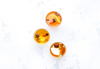 Mulled Cider glass cups: apple, pear and orange flavored hot cider with spices. Fermented low...