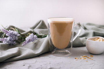 Almond milk latte in a glass