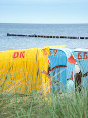  Wicker beach chairs on the beach of the Baltic Sea