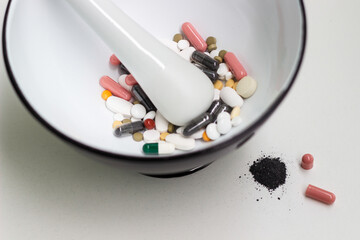 All the equipment needed for the production of drugs and medicines in capsule form. Pills and mortar