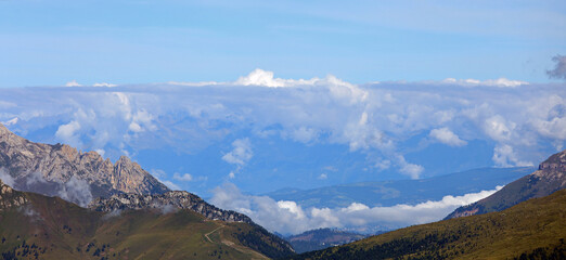 dolomites and italian alps mountains from peak of mount Rosetta Above the town of San martino di Castrozza