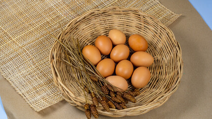 Basket of chicken eggs on a wooden table, Fresh product, Concept Eggs Fresh from farm.