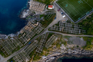 Cod fish drying racks in Henningsvær, Norway - aerial view
