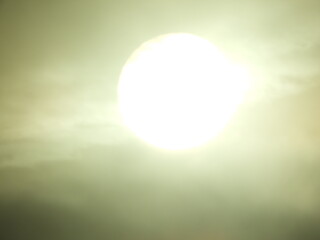 the light of the moon's silhouette that refracts into the universe illuminates the earth and warms the twilight and humans. the dark night are silent and calm hearing wind across the way. Focus blur