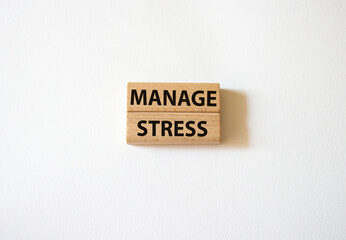 Manage stress symbol. Concept word Manage stress on wooden blocks. Beautiful white background. Business and Manage stress concept. Copy space