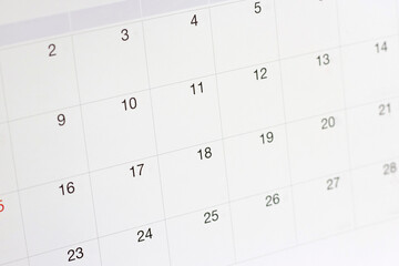 Dates on calendar page background,Closeup of numbers on calendar page	