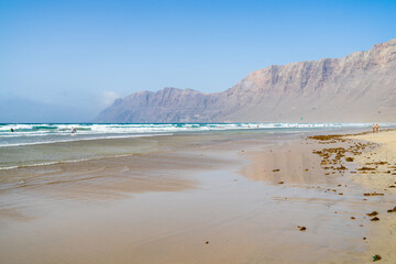 Famara Beach (Playa de Famara), popular surfing beach in Lanzarote. Canary Islands. Spain.