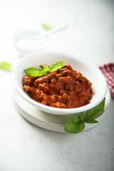 Homemade Bolognese sauce with fresh basil