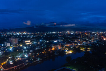 Fototapeta na wymiar Cityscape blue sky on twilight time in Chaing Mai city and Doi Suthep, Northern, Thailand.