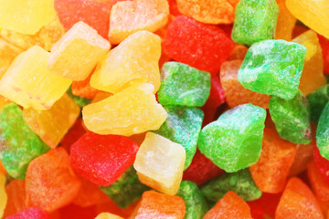 Colored candied fruit background, texture, closeup
