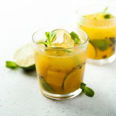 Refreshing passion fruit cocktail with lime