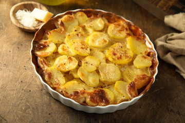 Traditional homemade potato gratin with cheese