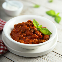 Homemade Bolognese sauce with fresh basil