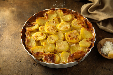 Traditional homemade potato gratin with cheese